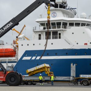 Conqueror Esbjerg transports a heavy cargo from Esbjerg, Denmark, to Aarhus, with Panama as the end destination