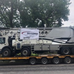 Conqueror Chicago moves a project cargo of 3 specially equipped trucks containing concrete placement telescoping conveyor systems